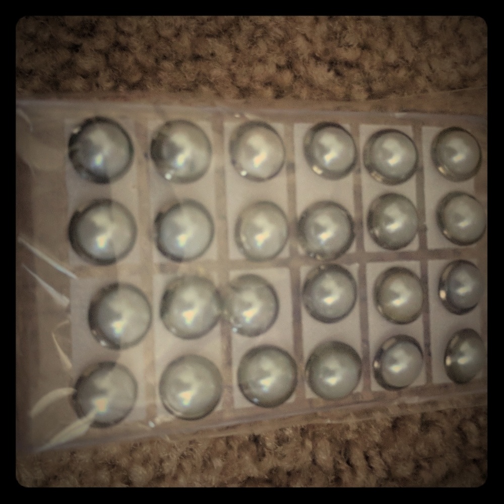 12 pairs of pearl earrings